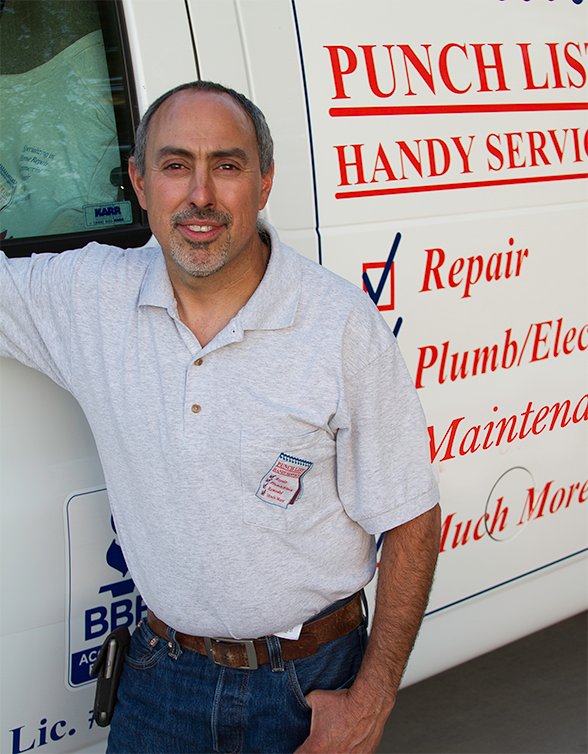 Rich Valdez, in front of the Punch List Handy Service work van.
